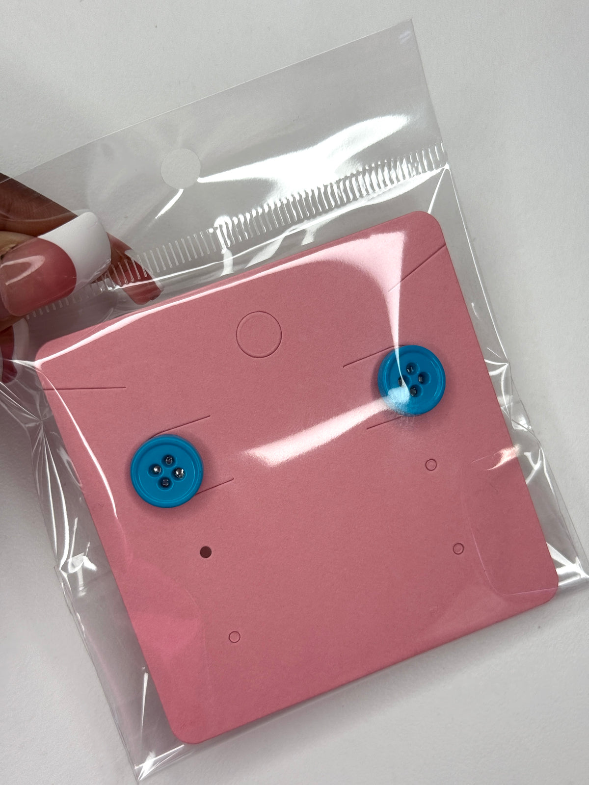 Blue button earrings