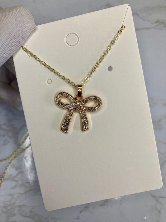 Gold bow necklace