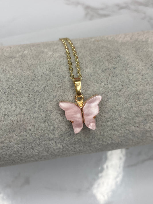 Baby pink fluttering butterfly necklace