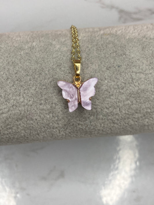 Purple fluttering butterfly necklace