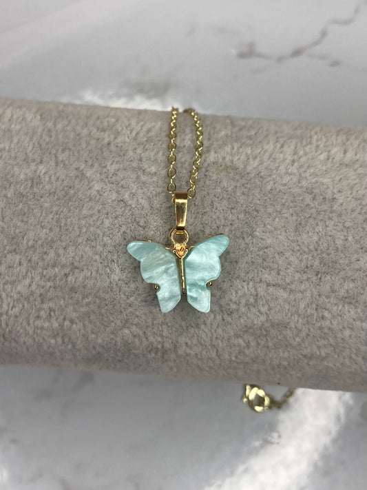 Teal fluttering butterfly necklace